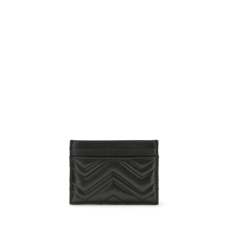 Black Lamb Ovis Aries Aries WalletThe GG Marmont Cardholder by Gucci belongs to the iconic GG Marmont line, reimagining versatile silhouettes in a palette of fresh and elegant tones. Crafted from chevron matelassé leather, it features the signature Double