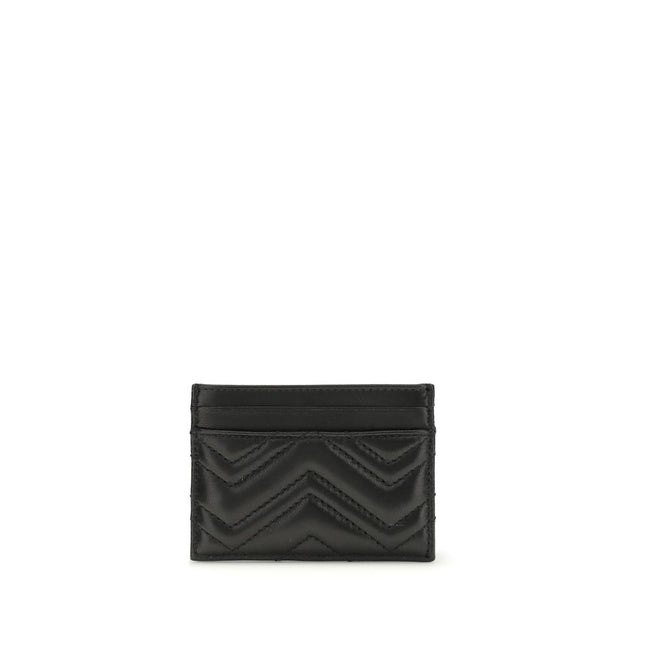 Black Lamb Ovis Aries Aries WalletThe GG Marmont Cardholder by Gucci belongs to the iconic GG Marmont line, reimagining versatile silhouettes in a palette of fresh and elegant tones. Crafted from chevron matelassé leather, it features the signature Double