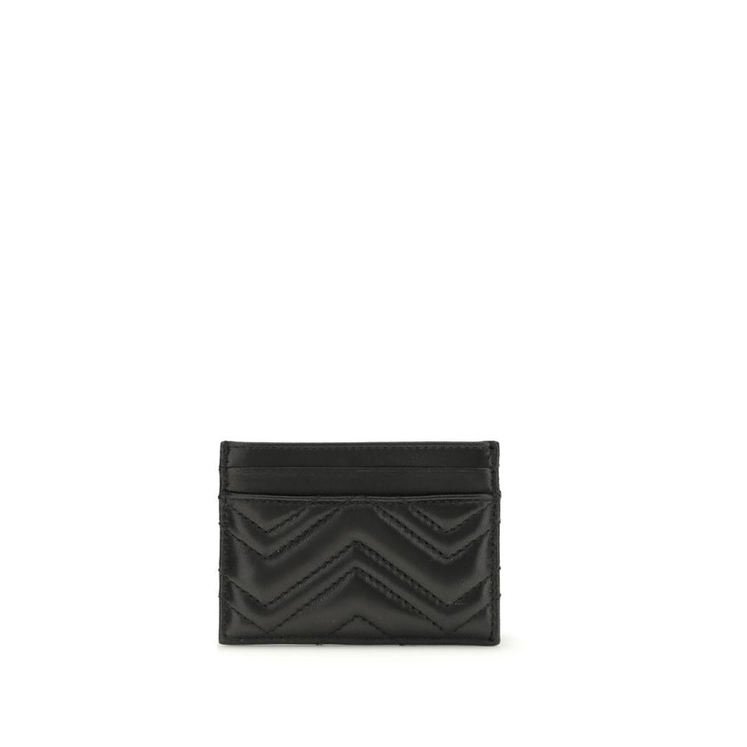 Black Lamb Ovis Aries Aries WalletThe GG Marmont Cardholder by Gucci belongs to the iconic GG Marmont line, reimagining versatile silhouettes in a palette of fresh and elegant tones. Crafted from chevron matelassé leather, it features the signature Double