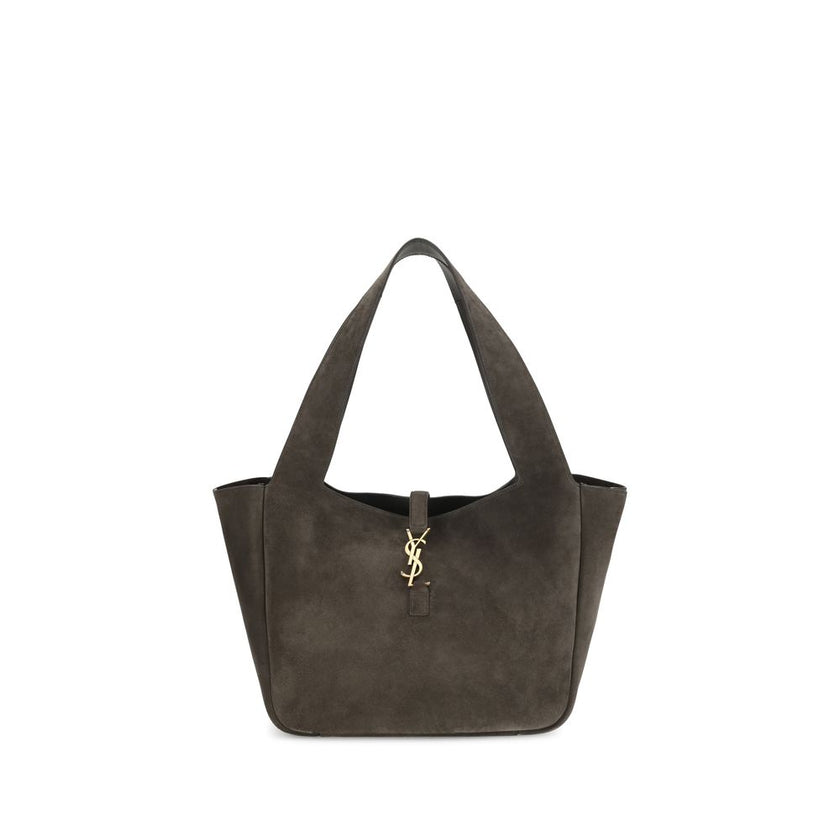 Brown Calf Leather Bos Taurus Shoulder BagThe Le 5 à 7 Bea Tote Bag by Saint Laurent, made of suede leather, is an elegant versatile accessory with a refined design. The closure features a strap with a Cassandre logo plaque and a snap button, giving it a
