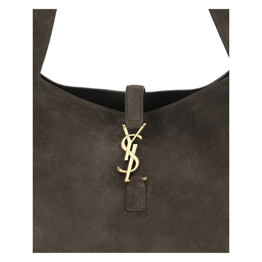 Brown Calf Leather Bos Taurus Shoulder BagThe Le 5 à 7 Bea Tote Bag by Saint Laurent, made of suede leather, is an elegant versatile accessory with a refined design. The closure features a strap with a Cassandre logo plaque and a snap button, giving it a