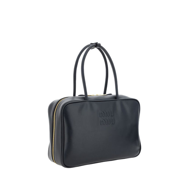 Black Calf Leather Bos Taurus HandbagMiu Miu’s Beau Leather Handbag is an elegant and refined accessory perfect for those seeking a touch of everyday luxury. Made of high-quality leather, it features two tubular leather handles that provide a comfortable