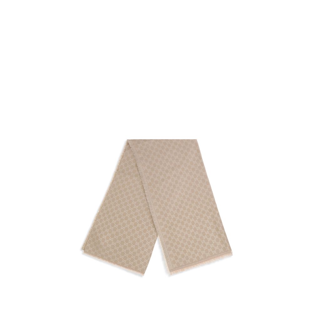 Beige Wool ScarfThe GG Supreme print wool Scarf by Gucci combines warmth and style in an iconic Maison accessory. Crafted from a wool blend with lurex threads, it features a GG print across the entire surface, while frayed hems complete the design with a
