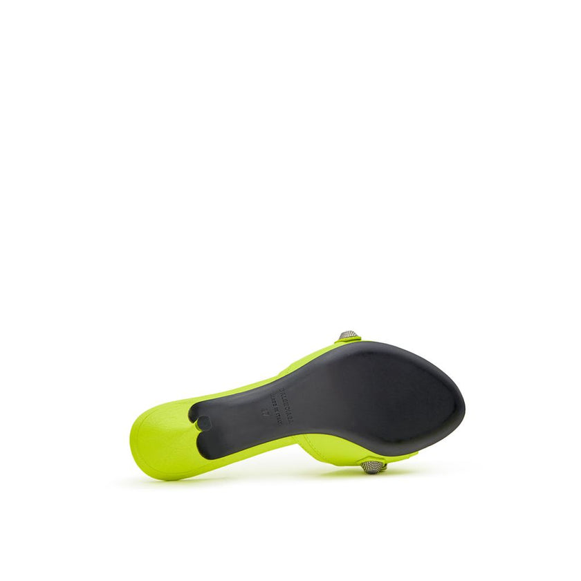Yellow Leather MulesBalenciaga Fluorescent Yellow Cagole Mule Slippers. Slightly pointed, in fluorescent yellow leather, with a studded strap and silver-tone hardware. Composition: 100% Leather Internal SKU: 25GIU236 Brand SKU: 69435WAD4E7381Yellow Leathe
