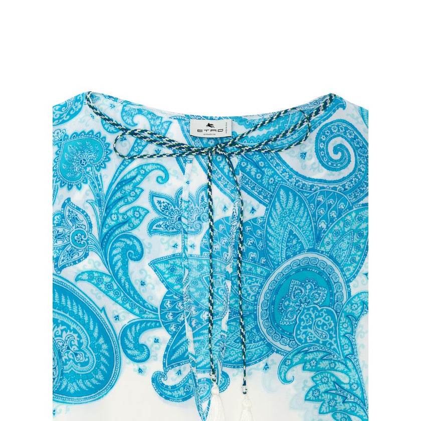 White Viscose Casual DressWhite and Blue Kaftan with Etro Print. In soft viscose with iconic Etro allover print, V-neck closed with lace, wide sleeve, two side welt pockets, side slits. Loose fit Composition: 100% Viscose Internal SKU: 25GIU120 Brand SKU: