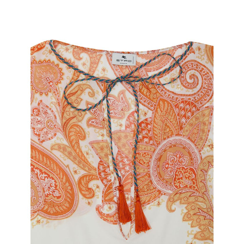 Bicolor Viscose Casual DressWhite and Orange Kaftan with Etro Print. In soft viscose with iconic Etro allover print, V-neck closed with lace, wide sleeve, two side welt pockets, side slits. Loose fit Composition: 100% Viscose Internal SKU: 25GIU121 Brand