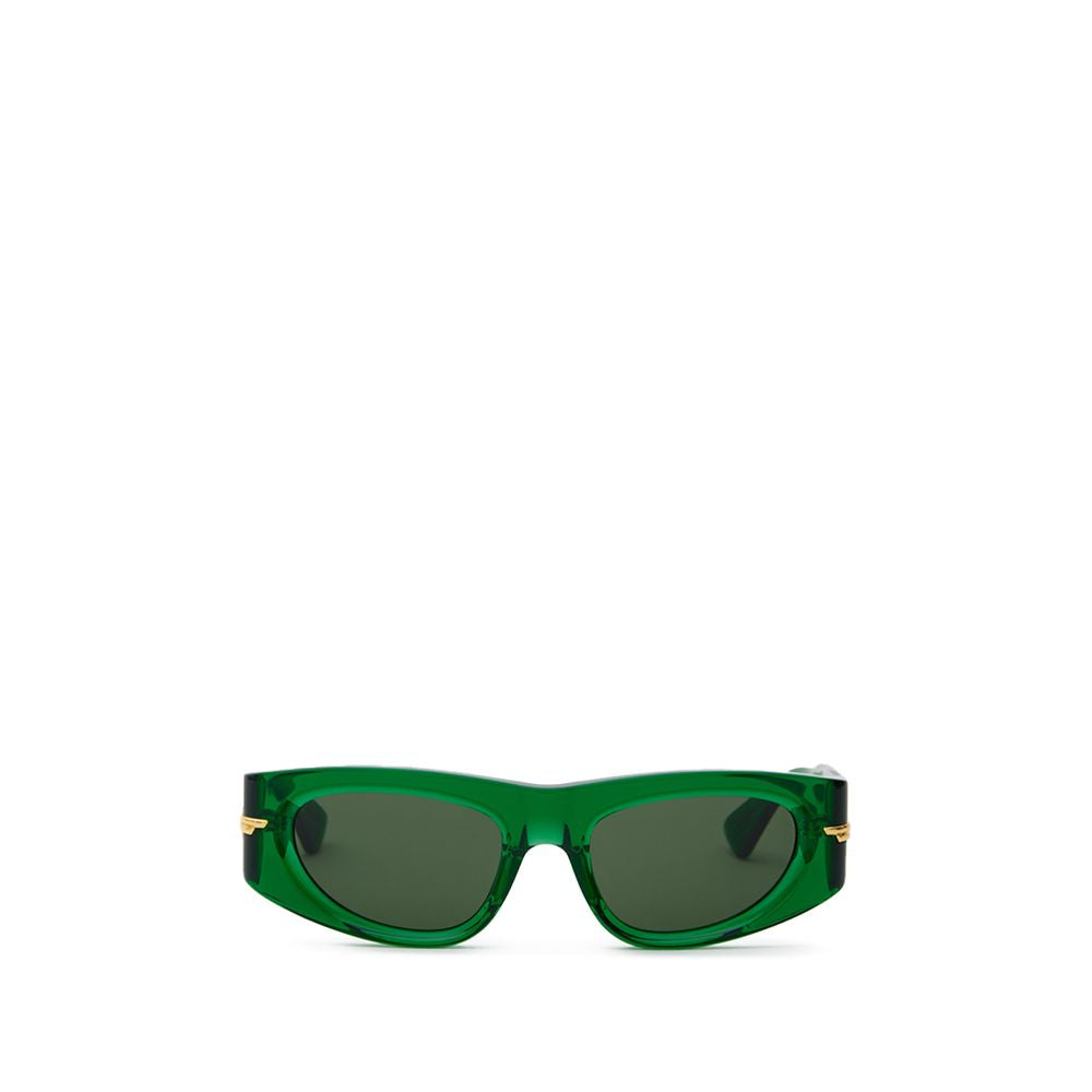 Green Acetate SunglassesBottega Veneta Transparent Green Acetate Sunglasses. Geometric frame, dark green lenses, gold details on the arms. Composition: Acetate Internal SKU: 25AGO34 Brand SKU: 703257V23303354Green Acetate Sunglasses${tagsBottega VenetaGre