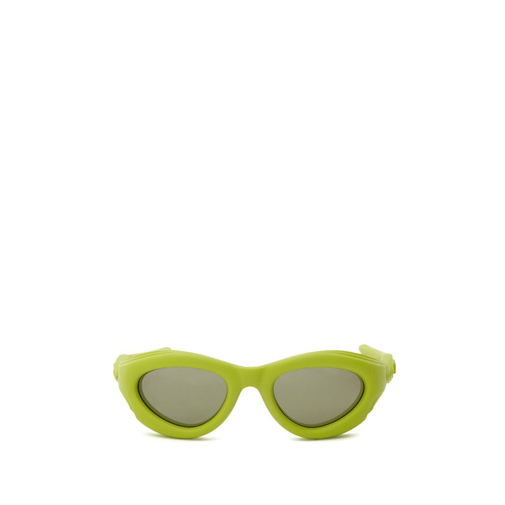 Yellow Acetate SunglassesBottega Veneta Lime Rubberized Acetate Sunglasses. Cat-eye style, dark lenses, thick frame with a satin finish. Composition: Acetate Internal SKU: 25AGO35 Brand SKU: 691541VBL803342Yellow Acetate Sunglasses${tagsBottega VenetaYell