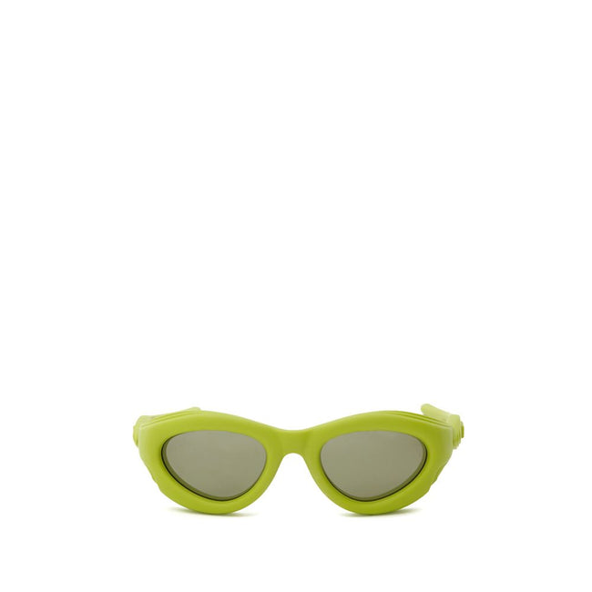 Yellow Acetate SunglassesBottega Veneta Lime Rubberized Acetate Sunglasses. Cat-eye style, dark lenses, thick frame with a satin finish. Composition: Acetate Internal SKU: 25AGO35 Brand SKU: 691541VBL803342Yellow Acetate Sunglasses${tagsBottega VenetaYell