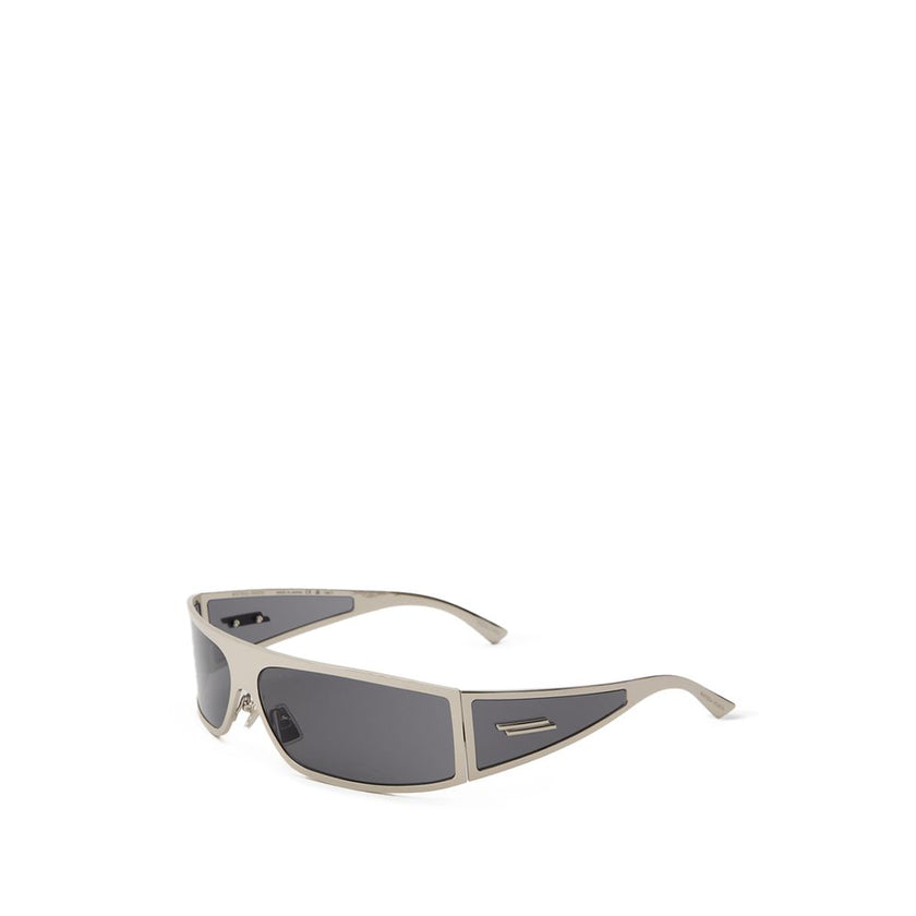 Gray Metal SunglassesBottega Veneta Silver Metal Wraparound Sunglasses. Rectangular wraparound gold metal frame, dark gray lenses, and temple details. Composition: Metal Internal SKU: 25AGO38 Brand SKU: 769241V44508107Gray Metal Sunglasses${tagsBottega Ve