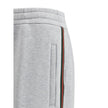 Gray Cotton Joggers (Workout Pants)Gucci’s Cotton Sweatpants are a perfect example of sporty elegance. Featuring side bands in the brand’s iconic colors, they add a distinctive and recognizable touch to the design. The iconic Gucci monogram is stitched on