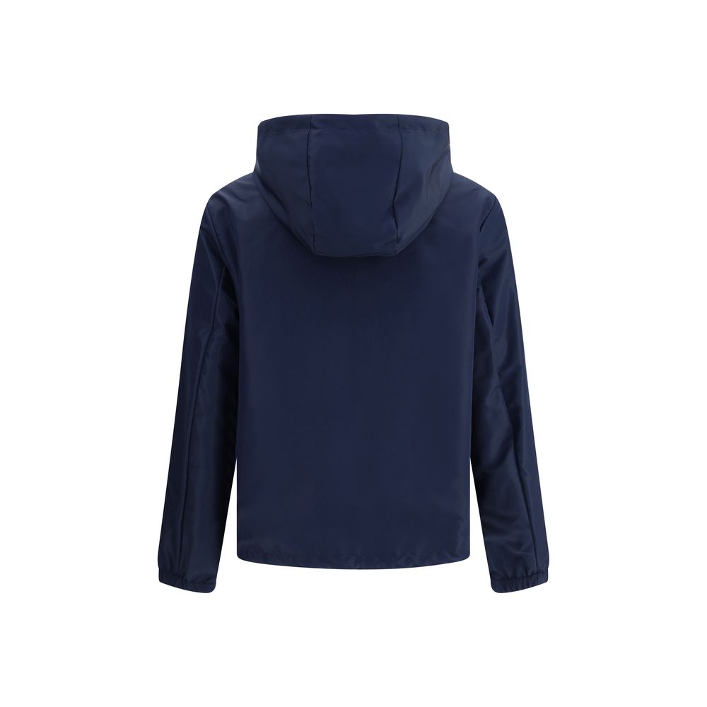 Blue Polyester Shell JacketReversible waterproof Jacket by Fendi, designed to combine functionality and iconic style. The model features an adjustable hood with drawstring, front closure with double-slider zipper, two side welt pockets, elastic cuffs and