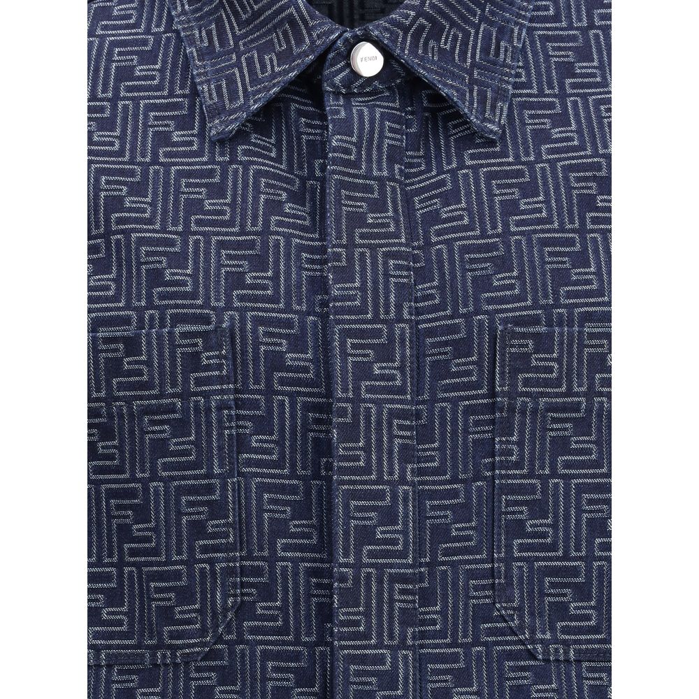 Blue Cotton Denim JacketDenim Jacket by Fendi, inspired by the classic shirt pattern and featuring a denim design with the iconic all-over FF jacquard weave. The garment features a classic collar, front snap-button closure, two side welt pockets and two s