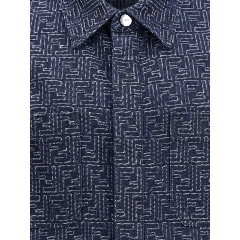 Blue Cotton Denim JacketDenim Jacket by Fendi, inspired by the classic shirt pattern and featuring a denim design with the iconic all-over FF jacquard weave. The garment features a classic collar, front snap-button closure, two side welt pockets and two s