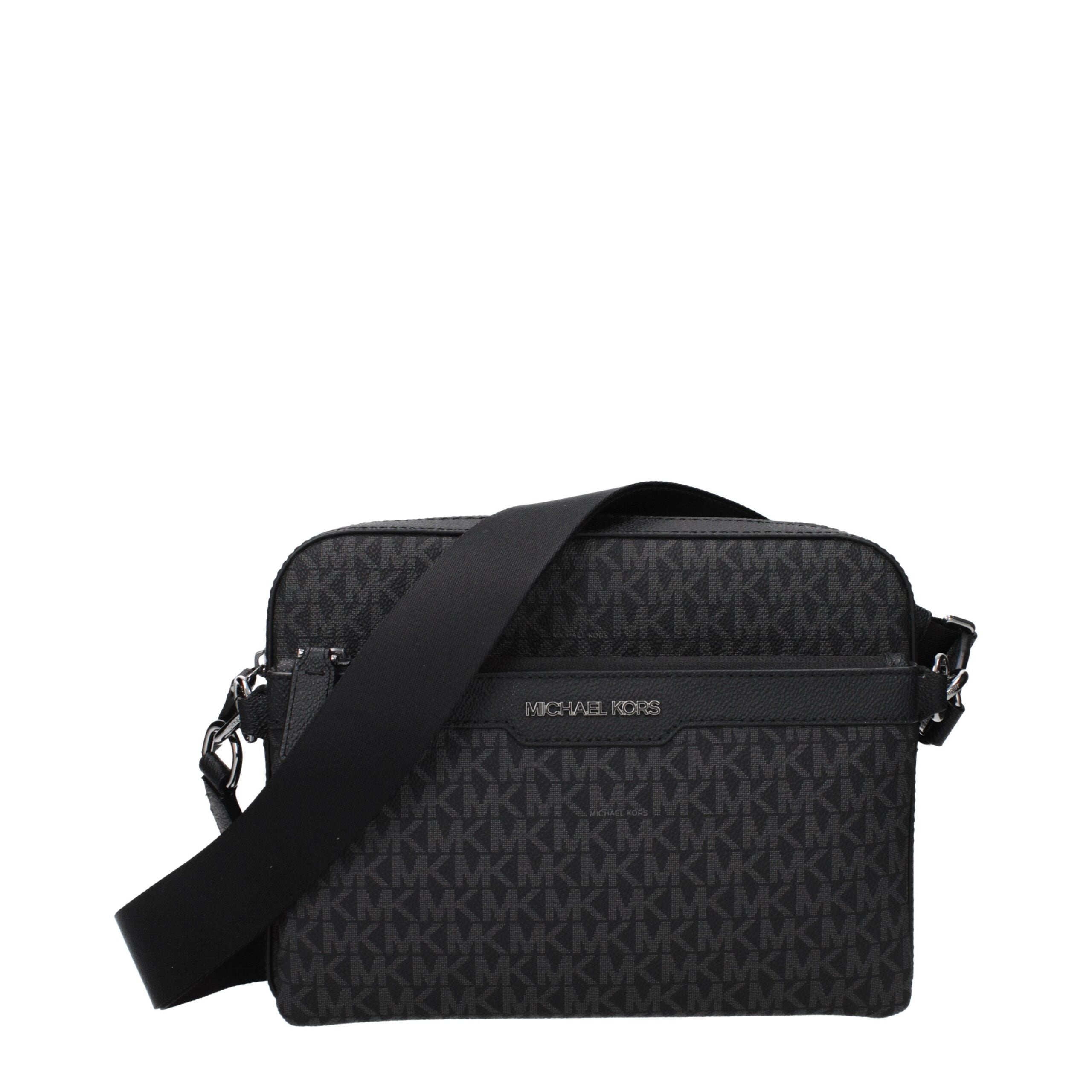 Black Fabric Crossbody BagDescription: The product with MPN 37S5LCOC5BBLACK and code F85197 fabric in black is a crossbody bags designed by Michael Kors. It has features like logo, front logo, removable outer clutch, adjustable shoulder, removable shoulde