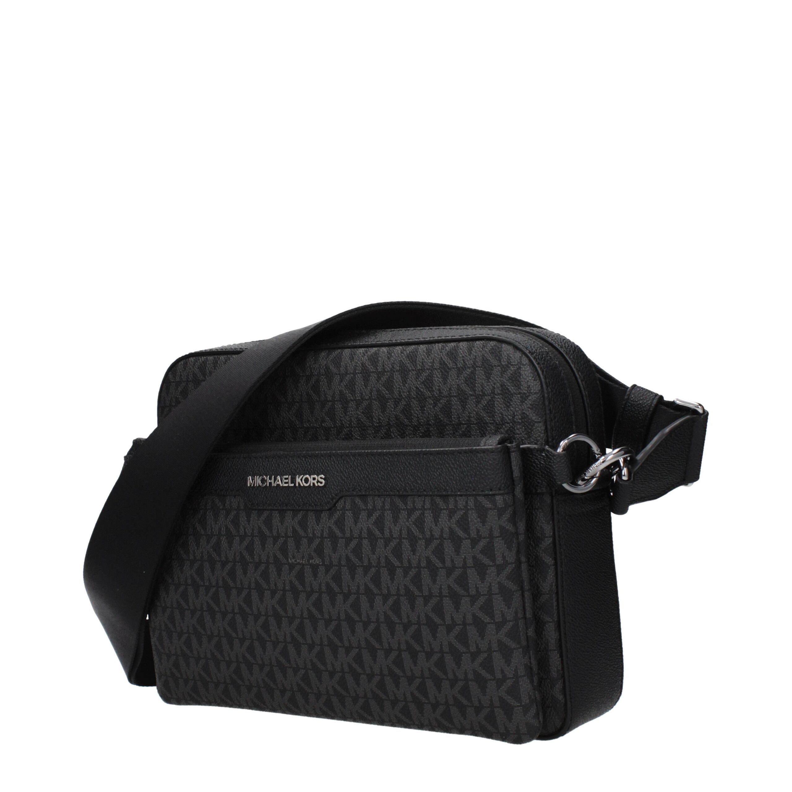 Black Fabric Crossbody BagDescription: The product with MPN 37S5LCOC5BBLACK and code F85197 fabric in black is a crossbody bags designed by Michael Kors. It has features like logo, front logo, removable outer clutch, adjustable shoulder, removable shoulde