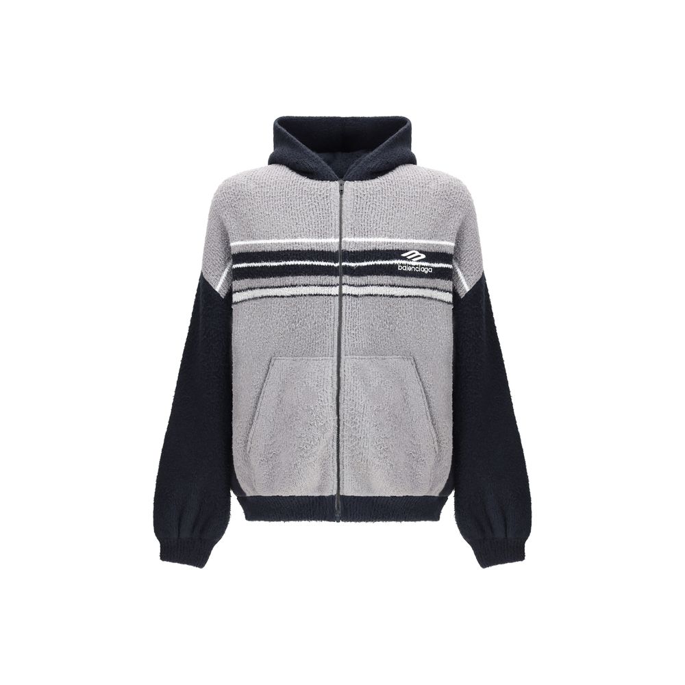 Multicolor Cotton SweatshirtThe fluffy zip-up Hoodie by Balenciaga is a soft, cozy hooded sweatshirt crafted from plush-effect fabric for a luxurious feel. It features a front zip closure, divided kangaroo pockets, and the Balenciaga logo embroidered on t