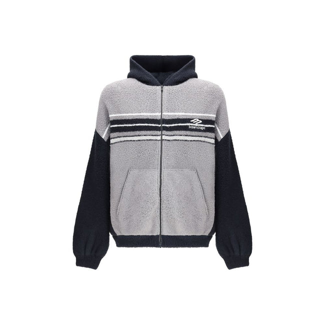 Multicolor Cotton SweatshirtThe fluffy zip-up Hoodie by Balenciaga is a soft, cozy hooded sweatshirt crafted from plush-effect fabric for a luxurious feel. It features a front zip closure, divided kangaroo pockets, and the Balenciaga logo embroidered on t