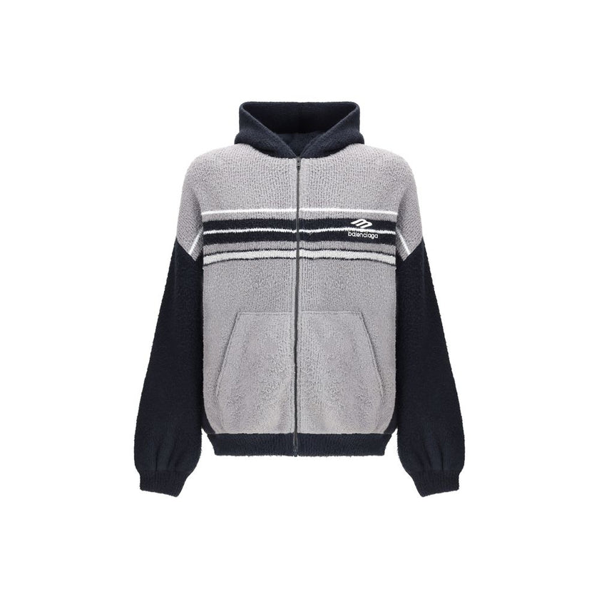 Multicolor Cotton SweatshirtThe fluffy zip-up Hoodie by Balenciaga is a soft, cozy hooded sweatshirt crafted from plush-effect fabric for a luxurious feel. It features a front zip closure, divided kangaroo pockets, and the Balenciaga logo embroidered on t