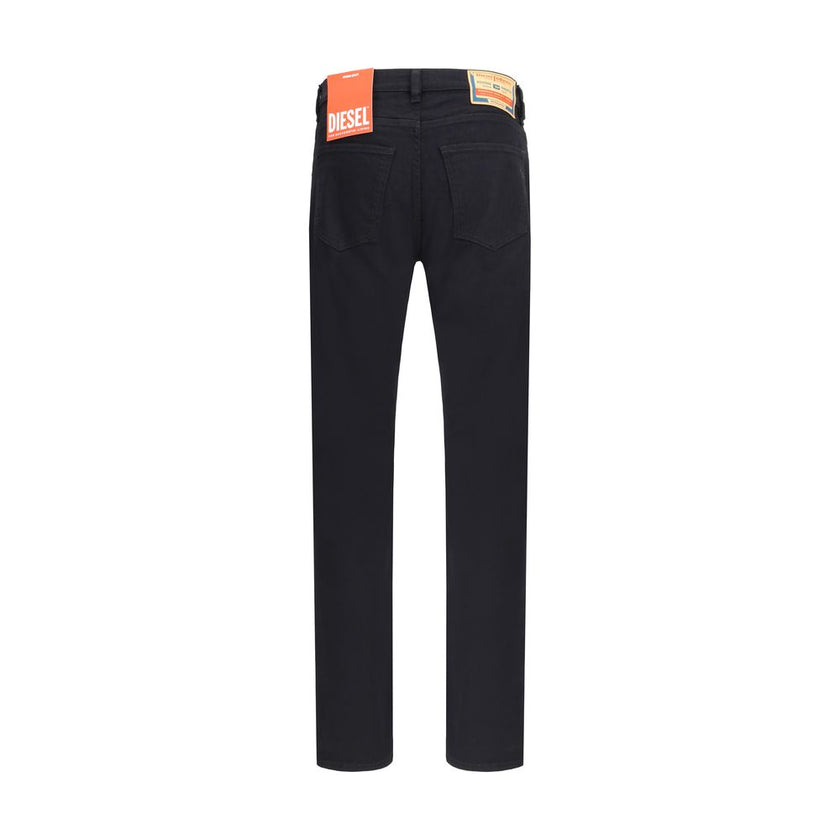 Black Cotton Slim Fit JeansThe 2019 D-Strukt 069YP slim Jeans by Diesel feature a slim fit with a mid-rise waist and narrow leg. Designed with clean, comfortable lines that minimize leg creasing, they ensure a sleek and modern silhouette. Made from stretc