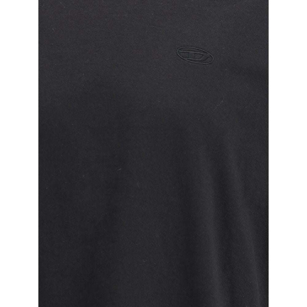 Black Cotton T-ShirtThe T-Boggy-Megoval-D T-shirt by Diesel is crafted from washed organic cotton jersey, featuring a soft, relaxed fit for everyday comfort. Its minimalist design is elevated by a contrasting macro Oval D embroidery on the back and a smal