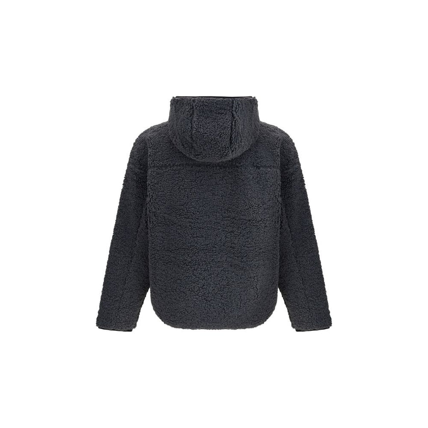 Black Polyester SweatshirtThe S-Zat teddy Hoodie by Diesel features an oversized fit crafted from soft teddy fabric for a cozy, modern look. The design is enhanced by a corded Oval D logo embroidery on the front, while the jersey-lined interior ensures ex