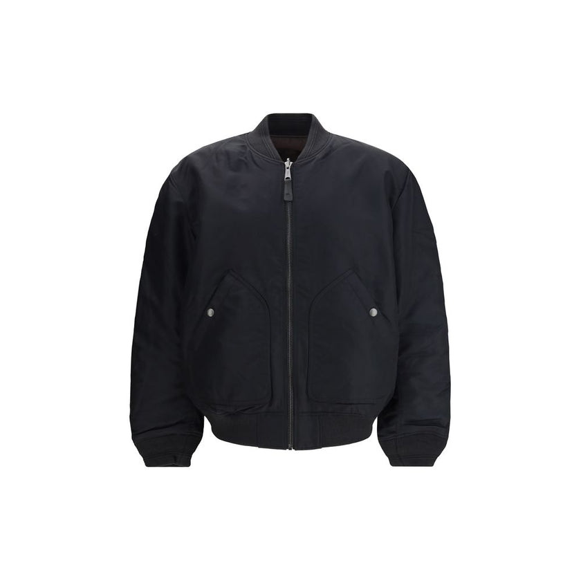 Black Polyamide BomberThe J-Held padded nylon Bomber Jacket by Diesel is crafted from technical fabric made with certified recycled nylon fibers, reflecting the brand’s commitment to sustainability. Lightly padded for warmth and comfort, it features subtl