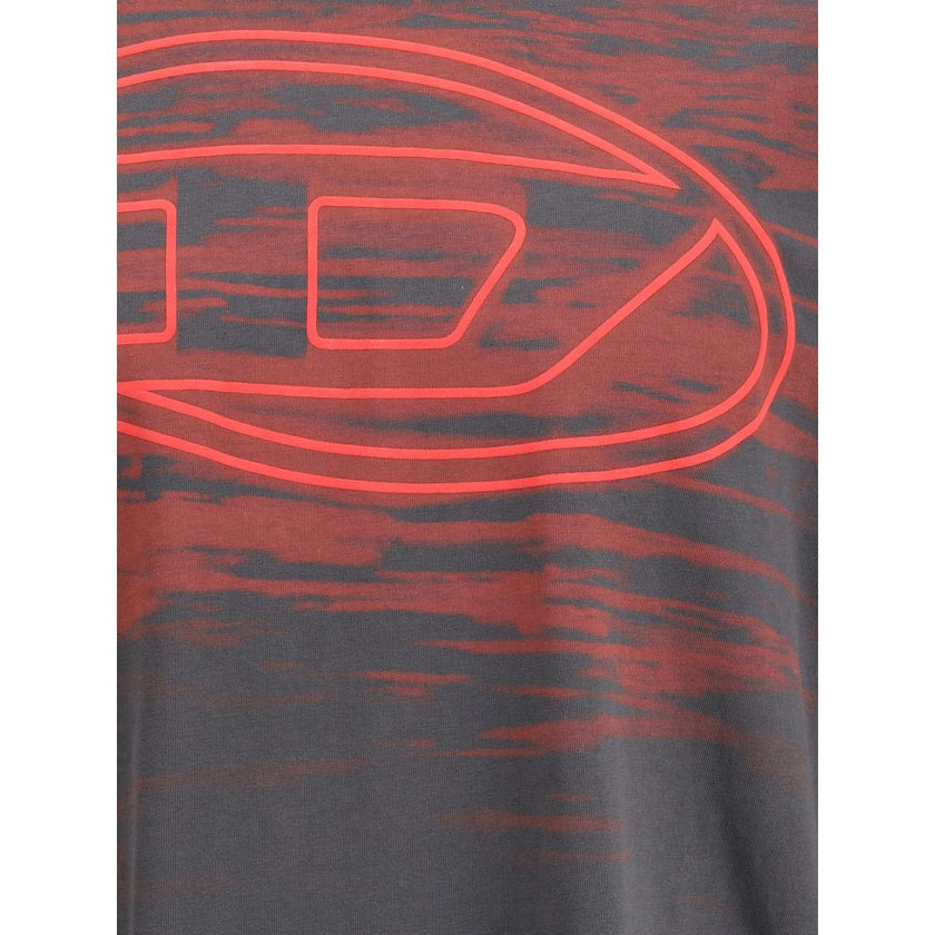 Black Cotton T-ShirtThe T-Boxt-T5 T-shirt by Diesel is crafted from pure cotton with a relaxed fit for comfort and everyday wear. Featuring a ribbed crewneck, short sleeves, and a bold Oval D print on the front, this piece embodies Diesel’s iconic casual