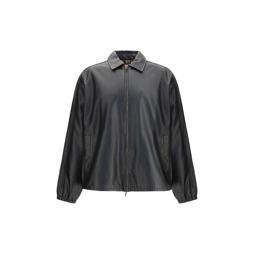 Black Polyester Biker JacketThe J-Ake Jacket by Diesel is crafted from black technical fabric featuring a hand-brushed treatment that lightens the edges, creating an authentic lived-in look. Its relaxed fit can be adjusted with an elastic drawstring hem,