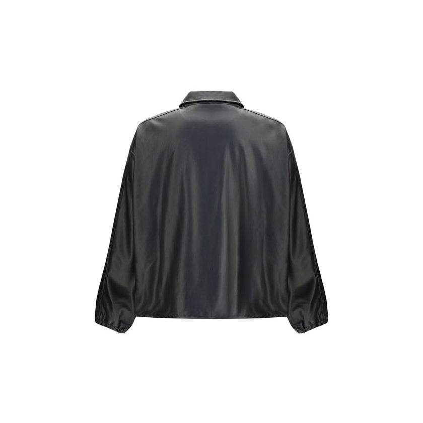 Black Polyester Biker JacketThe J-Ake Jacket by Diesel is crafted from black technical fabric featuring a hand-brushed treatment that lightens the edges, creating an authentic lived-in look. Its relaxed fit can be adjusted with an elastic drawstring hem,