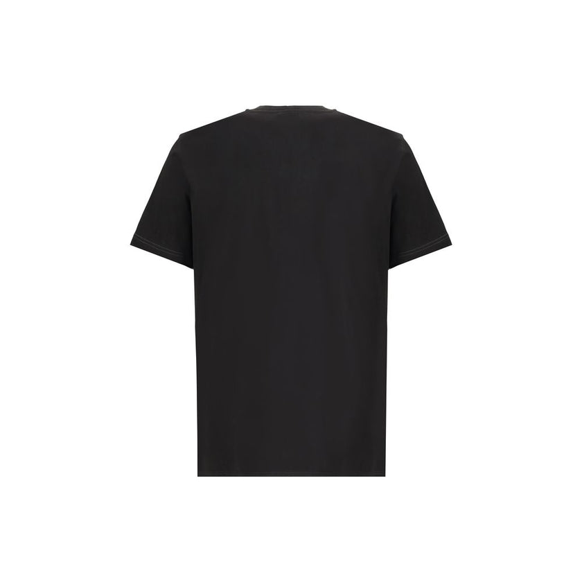 Black Cotton T-ShirtThe T-Adjust-T3 T-shirt by Diesel is a short-sleeved cotton tee featuring a classic crew neck. The design is enhanced by a graphic print and a logo detail, adding a modern, urban touch ideal for completing bold everyday looks. Season: