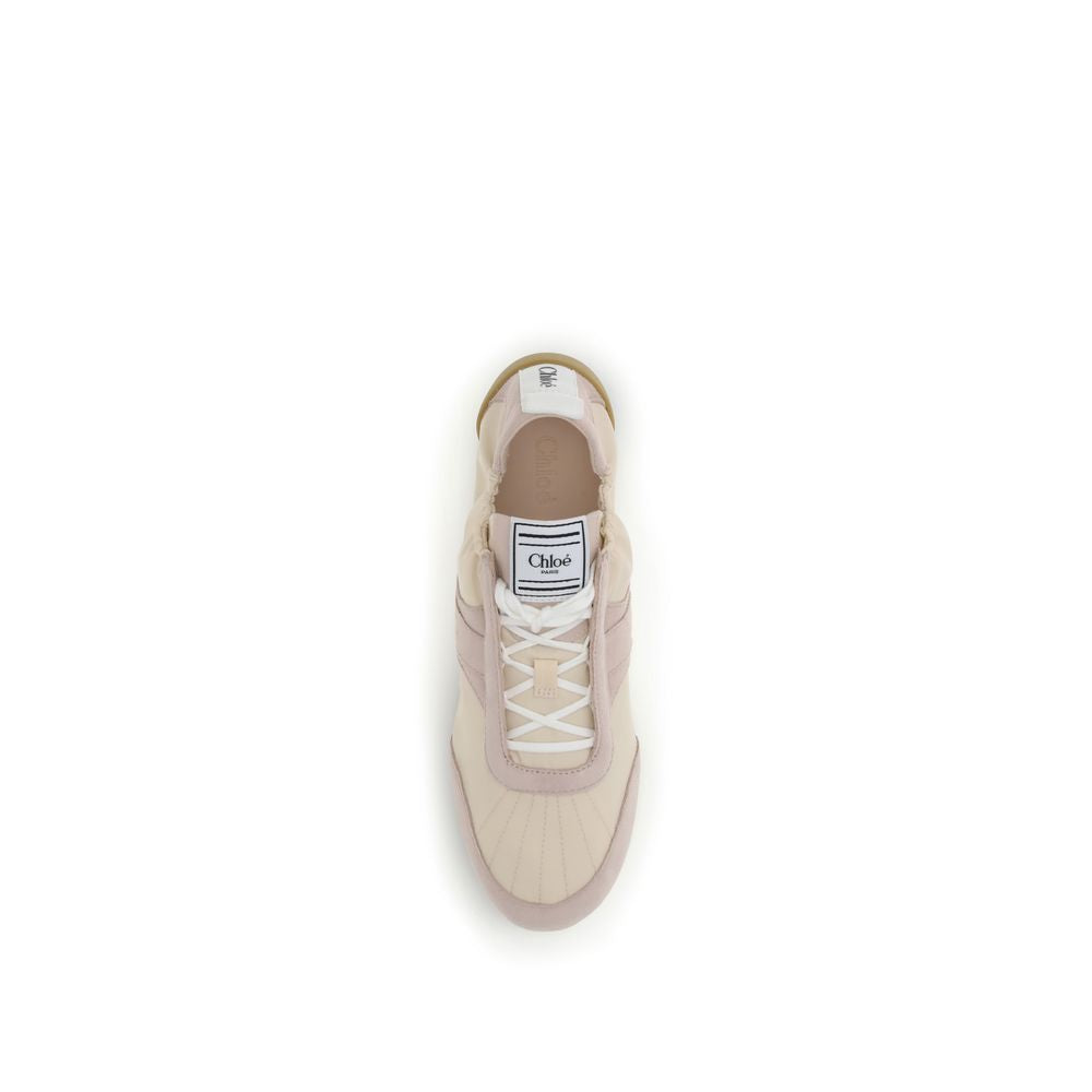 Beigefarbene Synthetik-Turnschuhe mit Wildleder-Details