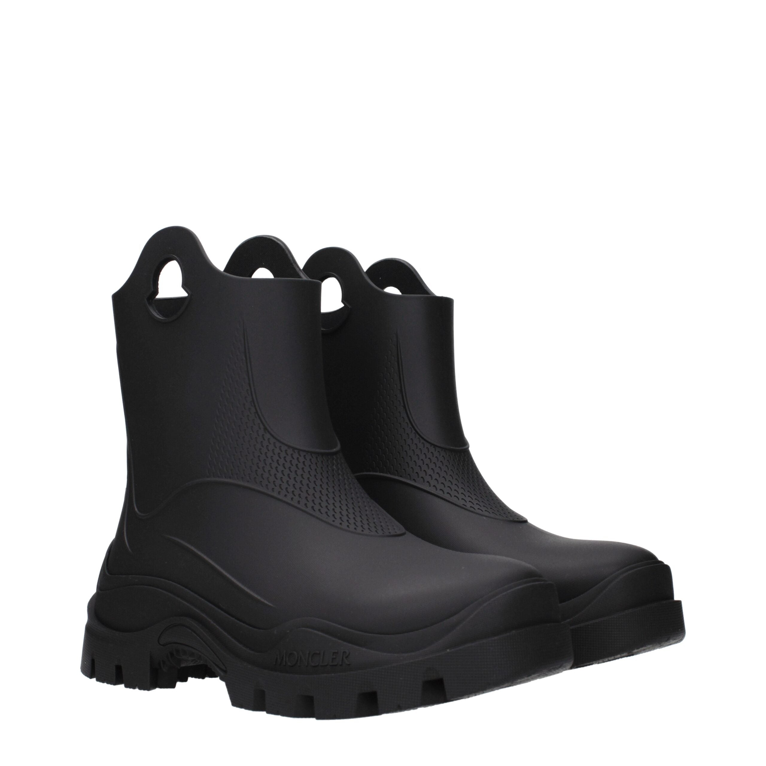 Schwarze Stiefeletten aus Leder mit Logo auf der Rückseite von Moncler
