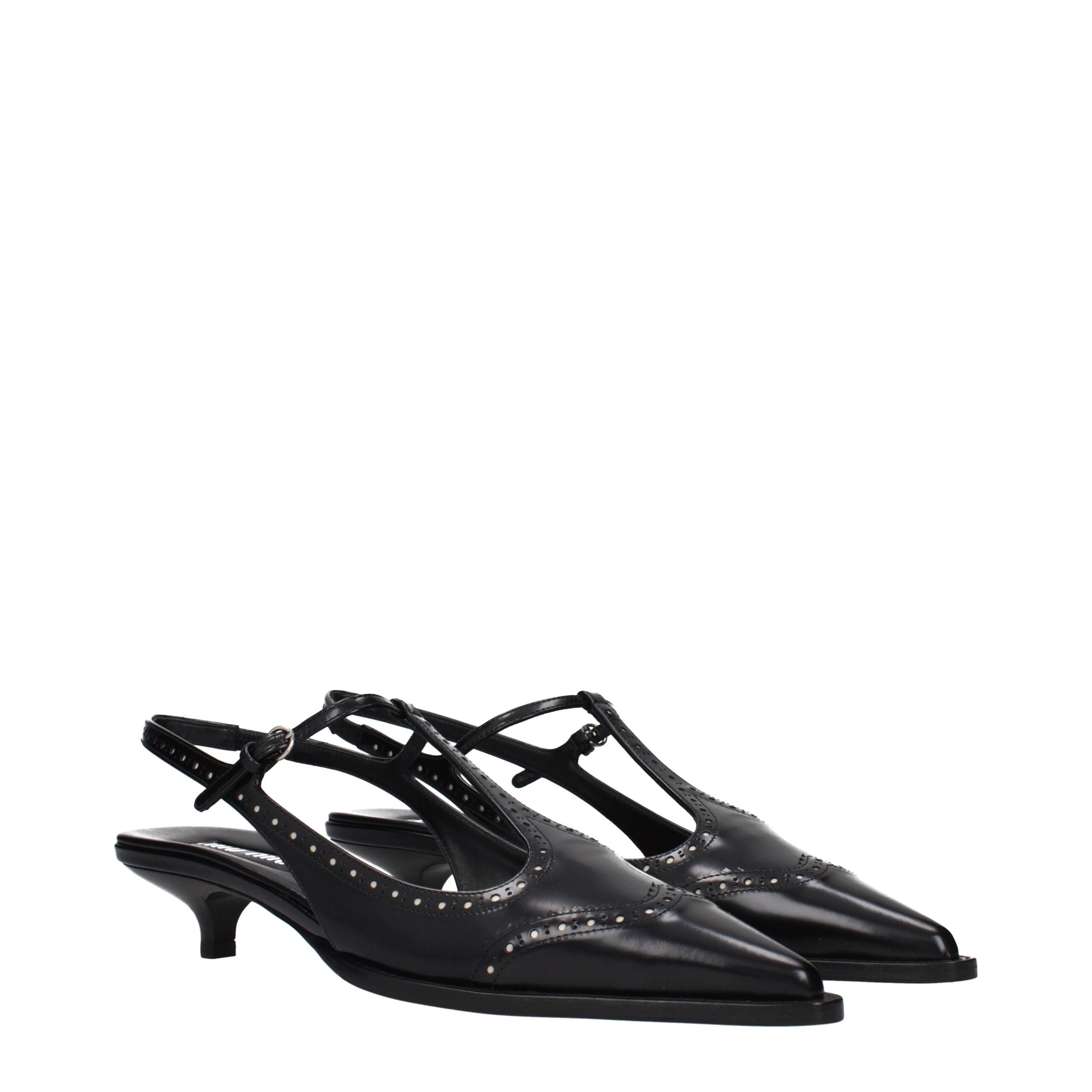 Schwarze Lederpumps mit mittlerem Absatz im Vintage-Look